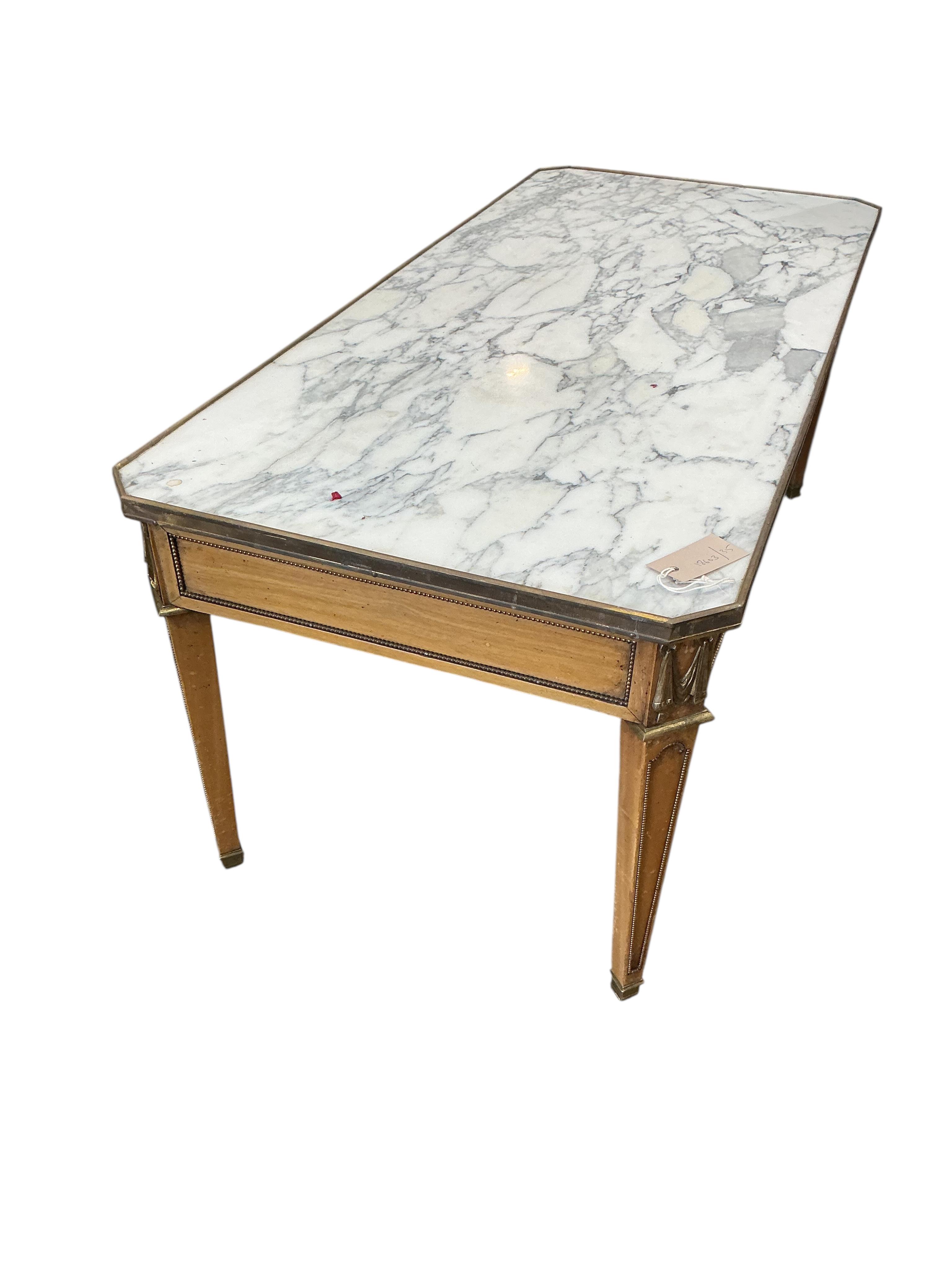 A Louis XVI style brass mounted faux marble top satinwood coffee table, width 110cm, depth 50cm, height 45cm.